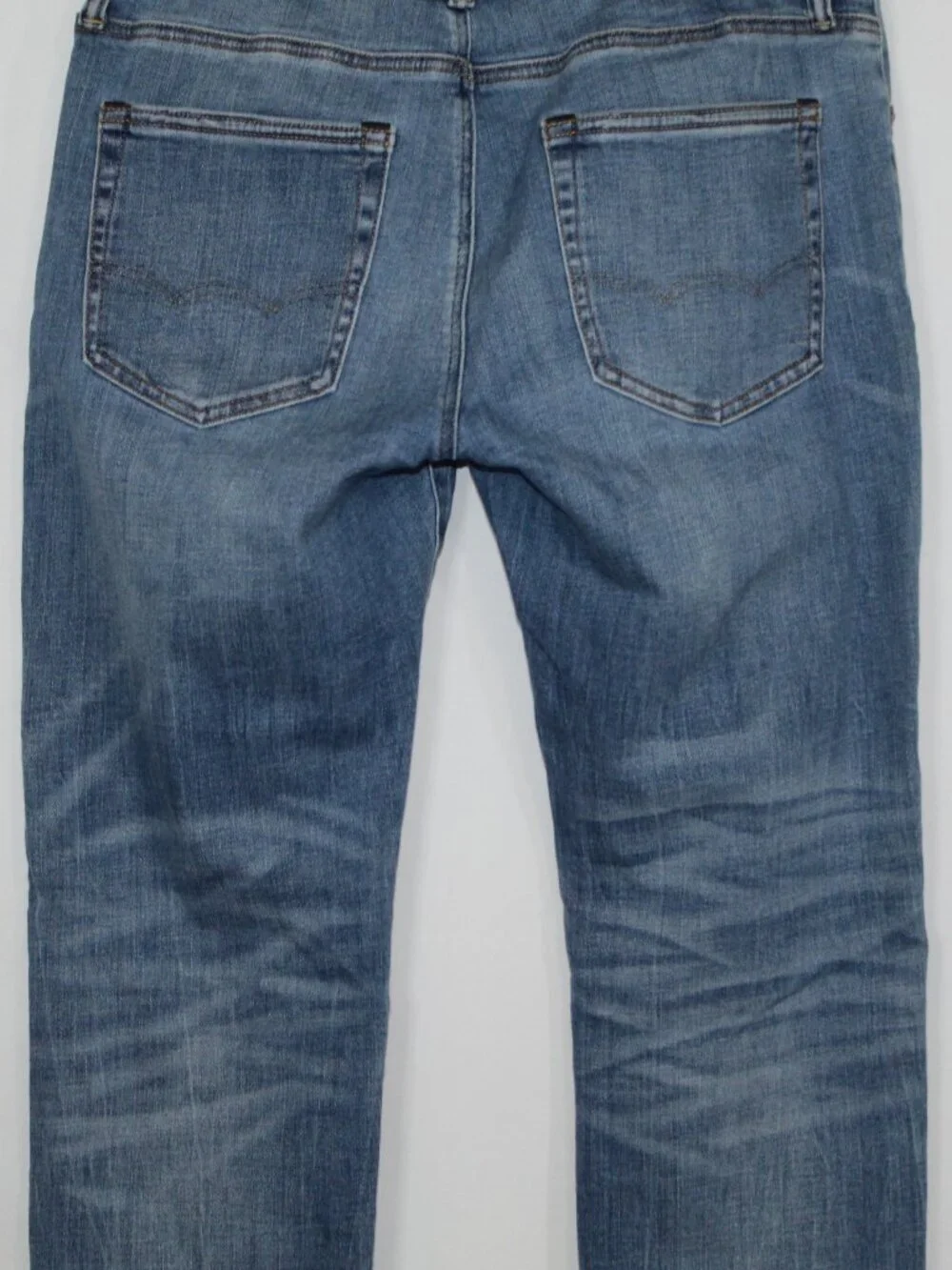 American Eagle slim straight next level stretch medium wash mid rise
